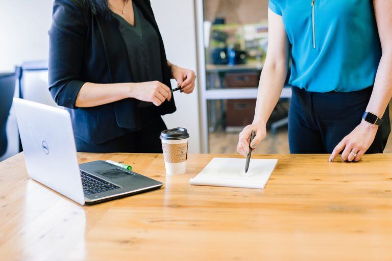 women at table working together