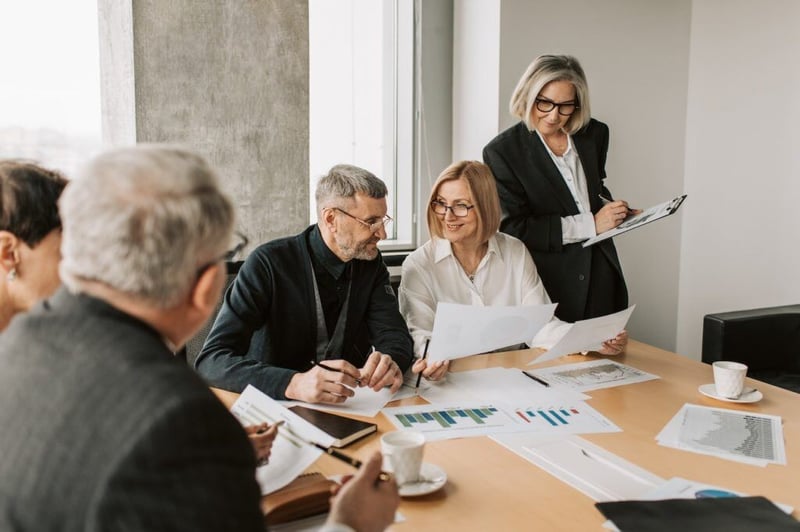 business professionals at a conference table
