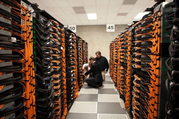 two men in a server room
